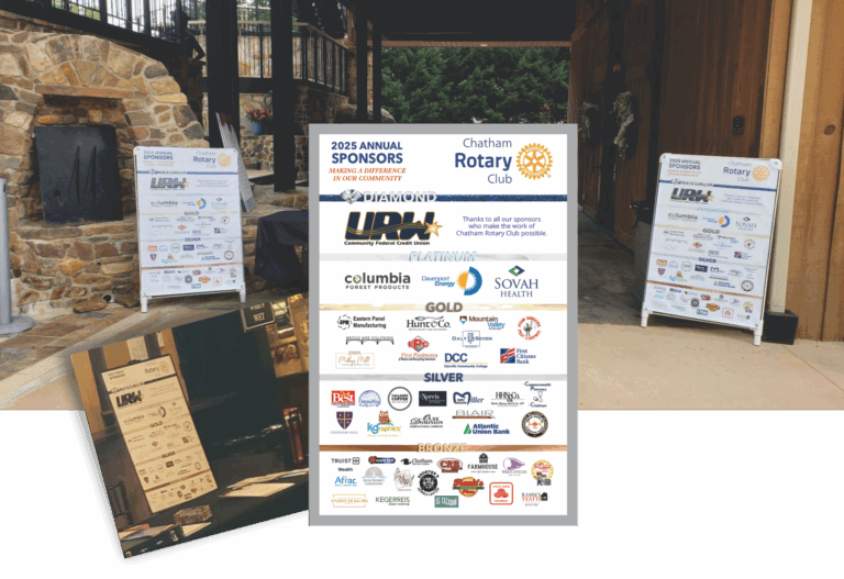 May show: A Chatham Rotary Club sponsor board is displayed at an outdoor event, flanked by two similar sponsor signs and a small table with event materials.